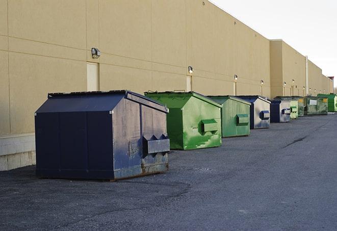 dumpsters lined up waiting to be filled with construction waste in Castile